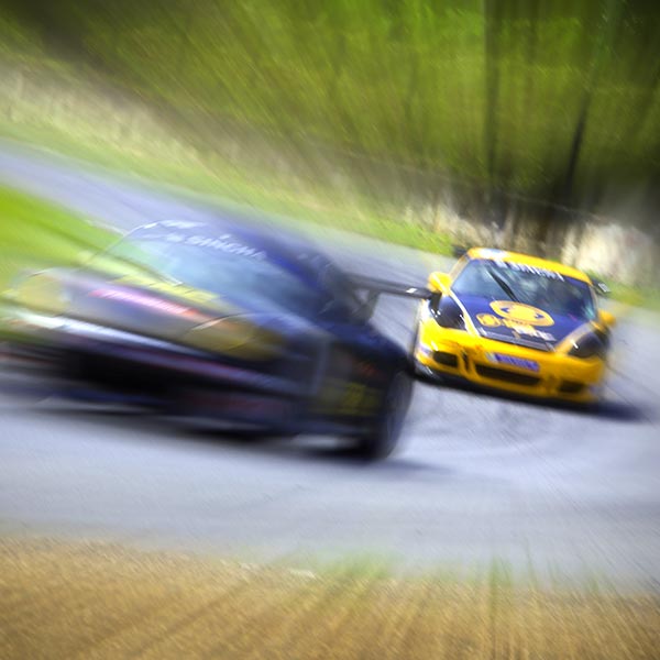 race cars in motion